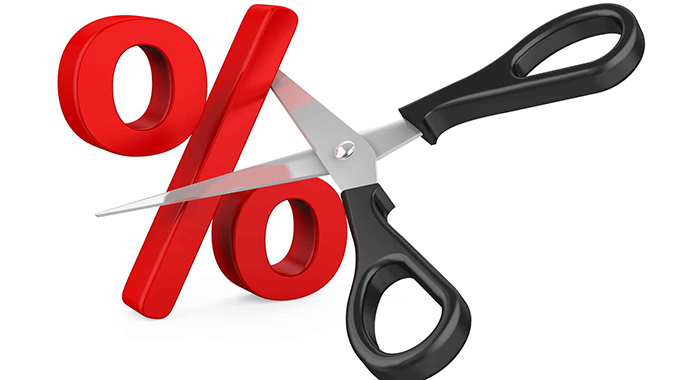 Fed cuts rates again as divide deepens