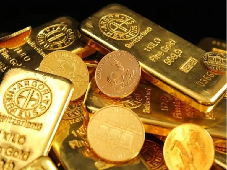 Gold, silver prices dip on dollar strength, trade talks